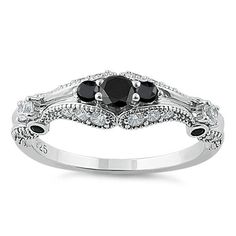 Top of ring height: 6mm

        Band width:  1.9mm

      Shank width: 1.6mm

    
        Stone material:  black & clear cubic zirconia

      Center stone size: 3.2mm

      Stone shape:  round

      Center stone carat    weight: .14 ct.

      Total number of stones: 29

      Stone setting: prong setting

   
       Metal:  925 sterling silver

      Plating: rhodium plated    (what is rhodium?) What is Rhodium? 
 
   If you're not familiar with Rhodium, it's a rare metal in Classic Black Rings With Accent Stones, Black Diamond Ring With Accent Stones, Black Diamonds Round Promise Ring, Black Diamond Ring With Round Band, Classic Black Diamond Ring With Round Band, Black Diamond Stackable Promise Rings, Black Diamond Ring With Diamond Accents For Promise, Black Diamond Rings With Accent Stones, Formal Black Cubic Zirconia Diamond Ring