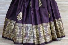 Look classy and elegant in this gorgeous purple tussar Banarasi saree on special occasions! The saree has a contrasting foliate zari border and zari buta. It comes with a matching blouse piece. Shop online from Pure Elegance. Disclaimer: The actual product may vary slightly from the image. These are custom orders, hence expect slight variation in color, placement of the motif or buta. ESTIMATED DELIVERYBecause this is a custom order, it would take about 4 weeks from the date of purchase. RETURN POLICYThis product is a custom order and cannot be returned or exchanged. Banarasi Sari, Indian Designer Sarees, Look Classy, Fashion Journals, Banarasi Saree, Traditional Fabric, Banarasi Sarees, Indian Design, Blouse Dress