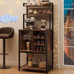 a coffee bar with two shelves filled with cups and other items next to a window