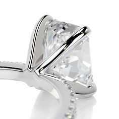 This is why radiant cuts are so popular! They give the most modern twist to classic rectangular cuts.Here is our 2.3-ctw radiant F VS2 engagement ring finished with a band of icy white diamonds.This has her name all over it.2 Carat Radiant F VS2 Diamond with an additional of 0.3 Carat Diamonds on the sides. This Ring is Certified by a Third Party Gemological institute 3 Carat Ring, Special Engagement Ring, 3 Carat Diamond, Measure Ring Size, Pave Engagement Ring, Vs2 Diamond, Types Of Diamonds, Engagement Rings Platinum, Pretty Rings