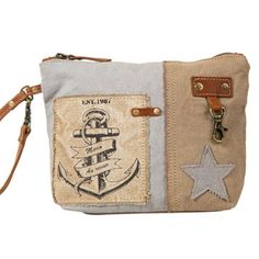 This Delightful Bag, With Its Charming Mariner Theme, Has A Wonderfully Textured, Rich Design. It Features Patchwork-Type Accents Of Canvas And Leather, A Worded Label, And A Sewn Star. Zipper-Close Top, Matching Canvas Back, And Durable Leather Wristlet Carrying Strap. Very Fun! View Less More Information Materials Canvas & Leather Item Width 10 Item Depth 2 Item Height 7.5 Handle 5.5 Beige Shoulder Bag With Zipper Pouch For On-the-go, Everyday Large Capacity Pouch Clutch, Large Capacity Pouch Clutch For Everyday Use, Large Capacity Everyday Use Clutch, Large Capacity Clutch For Daily Use, Beige Canvas Pouch Bag With Mobile Phone Holder, Beige Canvas Pouch With Mobile Phone Bag, Beige Bags With Zipper Pouch For Everyday Use, Beige Bag With Zipper Pouch For Everyday Use