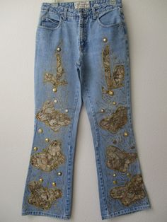 "HAND-EMBELLISHED Not Guilty Butterfly Design Embellished JEANS ✽ ✽ ✽ Original Butterfly Print Design, Hand-embellished by Iva Boutique ✽ ✽ ✽ BRAND - Not Guilty SIZE - 7/8 MATERIAL  ---- 100% cotton WAIST------------28\" HIPS ------------ 36\" RISE ------------- 9 1/2\" INSEAM -------- 30\" PATTERN ------- butterfly print CONDITION ----- pre-owned - excellent MATERIAL ------- sequin & glue glitter CLOSURE ------- front zipper PACKETS --------- front & back pockets WASH ----------- hand cold wash Straight Leg Denim Bottoms With Sequins, Straight Leg Denim Sequined Bottoms, Straight Leg Denim Jeans With Sequins, Straight Leg Sequin Denim Jeans, Fitted Straight Leg Jeans With Rhinestones, Sequined Straight Leg Denim Bottoms, Fitted Straight Leg Rhinestone Jeans, Sequined Straight Leg Denim Jeans, Embellished Straight Leg Denim Pants