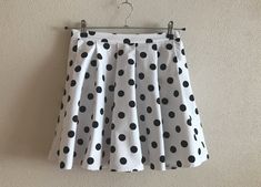 Polka Dot Skirt Vintage Mini Skirt White Black Dotted Mini Skirt Rock And Roll Womens Skirt Small Size Measurements: Waist: 14 1/4"/ 36 cm(lying flat) Length: 17.5"/ 44.5 cm Please check measurements to insure a proper fit. Remember to allow yourself some extra room for movement. You can compare these with something from your closet that fits you well. Condition: great Vintage Condition N.B. Color may slightly differ from picture SHIPPING * I ship worldwide via Priority mail  * Items are shipped Pleated Polka Dot Skirt For Party, Polka Dot Pleated Party Skirt, Polka Dot Pleated Skirt For Party, Party Polka Dot Pleated Skirt, Party Polka Dot Lined Skirt, Polka Dot Fitted Full Skirt, Fitted Polka Dot Mini Skirt, Polka Dot Lined Mini Skirt, Polka Dot Mini Skirt With Lining