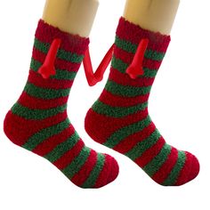 The arms on both sides of these Christmas hand-in-hand socks have built-in magnets that create an attraction when you get close, allowing you to hold hands with your partner. Made from high-quality material, these socks are both comfortable and durable. Get a pair for yourself or give it as a gift to someone special. Spread some joy with our funny magnetic hand-in-hand Christmas socks! Material: Polyester Hand In Hand Couple, Couple Socks, Hand Socks, Fleece Socks, Padded Hangers, Bed Socks, Outfit Christmas, Hold Hands, Warm Slippers