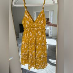 Never Worn. Beautiful, Flattering Summer Dress. Double Lined But Lightweight. Has Adjustable Straps. Perfect For Everyday, A Night Out, Or Vacation. Yellow Mini Sundress With Ruffles, Yellow Ruffled Mini Sundress, Yellow Ruffled Sundress For Summer, Casual Mustard Mini Dress With Floral Print, Mustard Floral Print Mini Dress, Mustard Floral Mini Dress, Casual Mustard Mini Dress For Spring, Yellow Mini Sundress For The Beach, Yellow Sundress Mini Length