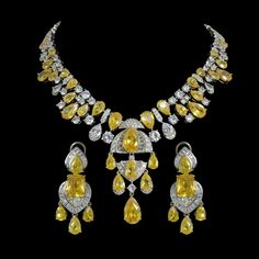 Yellow Diamond Necklace features a vibrant canary-colored cubic zirconia stone that adds a bright touch to any outfit.  Handmade with care, this designer jewelry set is perfect for bridal or wedding wear. A stunning statement piece and a thoughtful gift for someone special. *𝐏𝐑𝐎𝐃𝐔𝐂𝐓 𝐃𝐄𝐓𝐀𝐈𝐋* * 𝐌𝐚𝐭𝐞𝐫𝐢𝐚𝐥: Brass * 𝐏𝐥𝐚𝐭𝐢𝐧𝐠: White Rhodium Plated * 𝐒𝐭𝐨𝐧𝐞: AAA-quality CZ Diamond & Canary. *𝐃𝐈𝐌𝐄𝐍𝐒𝐈𝐎𝐍𝐒* *𝐍𝐞𝐜𝐤𝐥𝐚𝐜𝐞* * 𝐖𝐞𝐢𝐠𝐡𝐭: 114 gm * 𝐃𝐫𝐨𝐩 𝐋𝐞𝐧? Yellow Sapphire Necklace, Yellow Diamond Necklace, Canary Yellow Diamonds, Yellow Diamond Earring, Jewelry Sets Handmade, Canary Diamond, Neck Pieces Jewelry, Yellow Necklace, Fancy Yellow Diamond