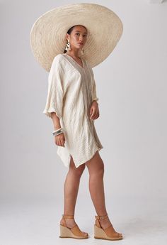 "🚚..ALL ORDERS ARE SHIPPED VIA DHL EXPRESS MAIL Float blissfully through the day in this comfortable relaxed kaftan dress. * Pullover style * V-neck front and back * Dropped shoulder; three-quarters sleeves * Brown stripe fabric front and back panels * Side slits * Unlined * Prewashed, Preshrunk Measurements approximately: Sleeve Length (from side of neckline): 23\" (58 cm) Armhole: 24\" (61 cm)-round Sleeve cuff: 20\" (51 cm)-round Bust: 50\" (127 cm-all around) Hips: 50\" (127 cm-all around) Casual Beige V-neck Cover-up, Spring V-neck Tunic For Loungewear, Spring V-neck Beach Dress, Oversized V-neck Tunic For Beach Cover-up, Spring V-neck Beachwear Tunic, Summer V-neck Relaxed Fit Kaftan, Casual V-neck Kaftan For Daywear, Beige V-neck Beach Dress Cover-up, Relaxed Fit Long Sleeve Dress For Beach Season