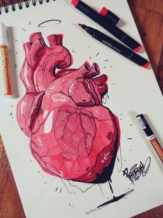 a drawing of a heart on paper with markers