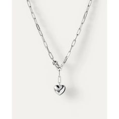 This puffy heart pendant is attached to a paper clip chain making it the perfect necklace to dress up any outfit or a sweet gift for that special someone. Style this necklace with the matching Puffy Heart Huggy Earrings to complete the look. Trendy Sterling Silver Charm Necklace With Heart Pendant, Trendy Sterling Silver Heart Pendant Charm Necklace, Trendy Heart Charm Chain Necklace, Trendy Chain Necklace With Heart Pendant, Trendy Chain Necklace With Heart Charm, Heart Shaped Charm Necklace With Chunky Chain, Trendy Heart Necklace With Chain, Silver Cable Chain Necklace With Heart Pendant, Trendy Sterling Silver Heart Necklace