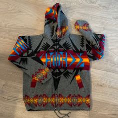 One Of A Kind Indigenous Ecuadorian Design. Soft Brushed Wool Exterior, Zipper Closure, Neck And Waist Drawstrings. Super Warm And Cozy! Unisex Nwot Multicolor Winter Hooded Jacket With Drawstring, Multicolor Hooded Jacket For Fall Outdoor Activities, Multicolor Hooded Jacket For Fall Outdoor, Multicolor Hooded Jacket For Fall, Multicolor Hooded Jacket For Cold Weather, Multicolor Winter Hoodie Outerwear, Multicolor Outerwear With Adjustable Hood For Fall, Multicolor Fall Outerwear With Adjustable Hood, Multicolor Winter Outerwear With Adjustable Hood