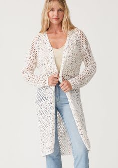 A vintage-inspired crochet knit cardigan in an ivory speckled knit. Crochet cardigan Speckled knit Relaxed fit Long sleeve Drop shoulder Mid-length Open front Vintage-inspired Lightweight bohemian cardigan Our best-selling crochet cardigan is back in a chic speckled knit. With long sleeves, a versatile mid-length, and an open front. The perfect light layer for the beach or running errands, we love to layer it over jeans and a simple tank top. Model is 5'9, wearing a size S.Style: I-51015K-SPA Spring Cozy Pointelle Knit Cardigan, Cozy Spring Pointelle Knit Cardigan, Cream Pointelle Knit Spring Cardigan, Spring Open Knit Cardigan, Fitted Chunky Knit Spring Cardigan, Fitted Chunky Knit Cardigan For Spring, Bohemian Knit Outerwear For Summer, Bohemian Soft Knit Outerwear, White Pointelle Knit Outerwear