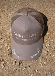 Retro inspired trucker hat, by the iconic Saint Tropez scene in the 1980's. Cream embroidery on a taupe colored hat. Matching both your favorite warm & cool toned outfits. Brown Summer Trucker Hat With Curved Bill, Brown Curved Bill Trucker Hat For Summer, Vintage Beige Snapback Trucker Hat, Vintage Beige Baseball Cap With Flat Brim, Cool Toned Outfits, Cream Embroidery, Wholesale Gifts, Taupe Color, Felt Hat