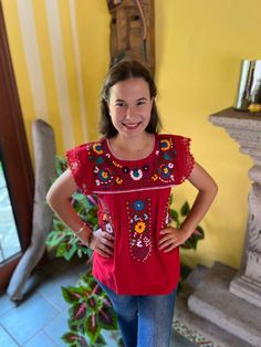 Beautiful Mexican blouse with floral style hand embroidery and lace details on the cuff. Each blouse is embroidered by hand and they are unique pieces so colors may vary. Mexican textile art has centuries of history and creativity throughout the country. Mexico is recognized as one of the leading countries with a beautiful artistic production in the textile world, miraculous hands of talented artisans from different states of the country create stunning embroidery clothing, and various items. #Oaxaca #Chiapas We ship anywhere in the word, from Tepic, Nayarit,  mx. Made by artisans from Oaxaca, Mx We recommend washing by hand with cold water, tender in the shade, to better preserve the original color. Traditional Blouse With Embroidered Sleeves, Multicolor Embroidered Sleeves Tops, Traditional Cotton Top With Embroidered Sleeves, Multicolor Bohemian Embroidered Top, Traditional Multicolor Embroidered Top With Embroidered Sleeves, Traditional Peasant Top With Embroidered Sleeves For Festivals, Bohemian Peasant Top With Multicolor Embroidered Neckline, Festival Embroidered Multicolor Top, Bohemian Peasant Top With Floral Embroidery