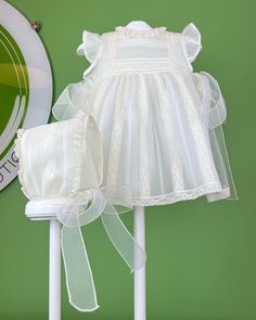 YoYo Children's Boutique Baptism Alaia Off-White Dress with Bonnet Spring First Communion Dress With Bow, Elegant Off-white Baptism Dress With Ruffles, White Lace Dress With Lace Bodice For Ceremonies, White Wedding Dress With Ribbon Detail, Elegant Organza Dress For First Communion, Sleeveless Lace Bodice Dress For Ceremony, White Lace Dress With Lace Trim, Elegant Spring Baptism Dress In Organza, Elegant Spring Organza Baptism Dress