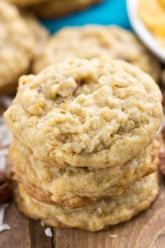 three cookies stacked on top of each other with pecans and nuts around the edges