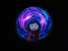 an animated character is in the middle of a dark tunnel with colorful lights on it