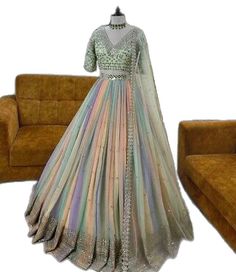 Festive Floor-length Gown For Wedding Reception, Festive Lehenga With Dupatta For Wedding Reception, Bollywood Style Dresses For Wedding Reception, Anarkali Style Lehenga For Wedding Reception, Anarkali Lehenga For Wedding Reception And Festive Occasions, Festive Anarkali Lehenga For Wedding Reception, Multicolor Wedding Gown With Sheer Dupatta, Floor-length Gown With Dupatta For Wedding Reception, Floor-length Lehenga With Dupatta For Wedding Reception