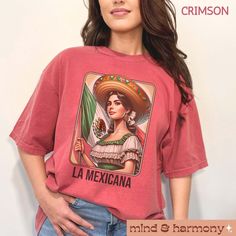 The La Mexicana Shirt Comfort Colors is a celebration of Mexican pride. This oversized tee features a retro graphic that honors Mexico Independence and Cinco de Mayo. Perfect for Latina women and those proud of their heritage, it's a cute and trendy gift for showcasing cultural pride in style. FIT & SIZING: * This garment dyed unisex t-shirts have just the right amount of cozy comfort. * Tees are comfortable and flattering for both men and women. * Please see the size chart in the photos to obta Mexican Tshirts Ideas, Oversized Screen Print Fan Merchandise Top, Oversized Screen Print Tops For Fan Merchandise, Oversized Retro Red T-shirt, Vintage Slogan Tops For Fan Merchandise, Oversized Graphic Print Tops For Fan Merchandise, Mexican Pride, Retro Graphic Tees, Pride Tshirts