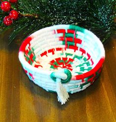 a christmas basket sitting on top of a wooden table