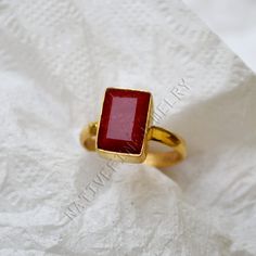 Ruby gold ring, 14K yellow gold ruby ring, cushion raw red ruby gemstone jewelry, welcome gift ring, July birthstone gold wedding gift ring ------------------------------- Size/Dimension (Approx) : All Sizes Available Gemstone : Raw Ruby Stone Shape : Cushion Stone Size (Approx) : 12x8 mm Stone Color : Red ------------------------------- The 14K yellow solid gold bezel and solid yellow gold ring are both shined to an extremely high polish. All rings are packaged and shipped in a beautiful ring box. The main stone is natural, round faceted, ruby. The pictures have been enlarged to show the details. The price is for a 14k gold ring, if you want to order the ring in 18k or 22k gold please convo me prior to purchase. IMPORTANT NOTES This gold jewelry is custom made order jewelry so its possibl Gold Rectangular Ruby Ring, Rectangular Ruby Ring Gift, Rectangular Ruby Ring For Gift, Gold Ruby Ring With Rectangular Stone For Anniversary, Rectangular Ruby Ring With Gold Setting, Minimalist Gold Ruby Ring, Gold Rectangular Ruby Ring Gift, Rectangular Red Ruby Ring Gift, Red Ruby Ring With Rectangular Stone For Gift