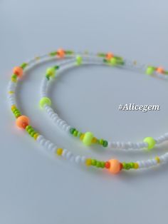 Neon colors summer necklace made with delicate high-quality Czech glass seed beads. This choker looks beautiful by itself or can be layered with other necklaces. ♥ The best gift you could give to yourself or to your friend. ♥  I hope you enjoy wearing them as much as I enjoy making them!  #alicegem ↠ ABOUT    ▢  Size: about 15 inches, goes up to about 17 inches with chain extension.  ▢  Materials: 2mm / 3mm quality Czech glass seed beads ▢  This item is handmade and may vary slightly from the pi Tiny Yellow Beads For Summer, Yellow Beaded Necklaces With Letter Beads For Summer, Casual Yellow Beads For Beach, Green Tiny Beads Necklace For Beach, Colorful Green Beaded Necklaces For Vacation, Green Beaded Necklaces For Vacation, White Beaded Chain Bracelets For Summer, Green Beaded Necklace For Vacation, White Summer Beaded Bracelets