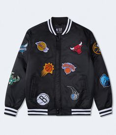 Show off your love for basketball with the NBA Team Logos Bomber Jacket. Featuring bold team logos and a stylish design, this jacket is perfect for game days or casual streetwear looks. A must-have for every NBA fan! Nba Teams, Casual Streetwear, Stylish Design, Team Logo, Nba, Must Haves, Bomber Jacket, Basketball, Street Wear