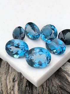 AAA+ Natural London Blue Topaz Oval, Loose Indicolite Blue Topaz, Brilliant London Topaz For Earrings, High Quality Topaz Gemstone, Topaz, Topaz For Ring, December Birthstone For Jewelry Making. Details :- Stone         =      Natural London Blue Topaz Size           =       6x8/8x10/7x9/9x11 MM Shape        =       Oval  Color         =       Blue ( Indicolite ) Hardness   =       8 (Mohs Scale) SKU  =  Make To Order Blue Oval Gemstones, Faceted Blue Round Gemstones, Blue Oval Faceted Gemstones, Blue Faceted Oval Gemstones, Faceted Blue Oval Gemstones, Blue Topaz Gemstones For Jewelry Making, Blue Round Natural Gemstones, Natural Blue Round Gemstones, London Topaz