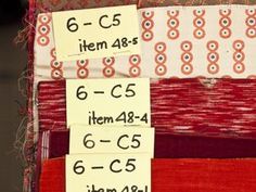 several pieces of fabric with numbers on them