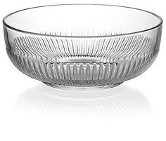 a clear glass bowl on a white background