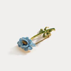 Blue flower Brooch, among our fine jewelry on Selnichast store. It is one of our enamel jewelry that you can give as a birthday gifts for friends or aniversay gift for wife. This is the best enamel jewelry that you cannot miss. This Blue Floral Brooch is a beautiful and timeless accessory for any outfit. Crafted with brass and enamel, this intricate brooch has a classic cottagecore aesthetic that is sure to elevate any look. Perfect for special occasions or everyday wear, this piece is sure to b Yellow Gold Enamel Brooches, Elegant Blue Enamel Brooches, Elegant Yellow Gold Enamel Pin Gift, Blue Enamel Brooch For Gift, Blue Enamel Brooch Gift, Blue Enamel Brooches For Gift, Elegant Enamel Brooch Pin, Yellow Gold Enamel Brooches For Gifts, Formal Flower Enamel Brooches