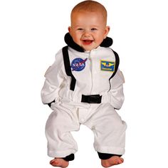 a baby dressed in an astronaut suit