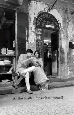 a man and woman sitting on a bench in front of a store with the caption all this hustle, for such moments