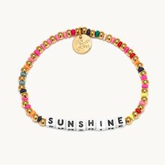 A gold beaded bracelet from Little Words Project®. With the word Shunshine. Little Words Project Bracelets, Sunshine State Of Mind, Little Words Project, Gold Beaded Bracelet, Beaded Things, We Are Festival, Trending Bracelets, Acrylic Letters, Gold Bead Bracelets