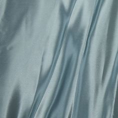 Create the custom garments, bedding, or home decor of your dreams with our pure silk fabric by the yard. This luxurious silk fabric comes in a misty blue hue with no pattern. Details Premium 100% silk fabric. Imported. Washable in cold water. Sold in full yard increments. 43” wide. Maximum continuous yardage varies. View our silk bedding care guide here. Blue Silk Fabric, Buckwheat Pillow, Tatami Mat, Silk Bedding, Sleep Pillow, Natural Fabric, Japanese Fabric, Blue Silk, Zen Garden