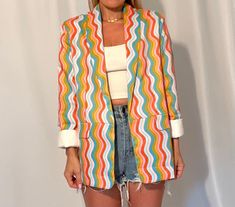 Funky blazer with colorful wavy rainbow design and white silky inner lining. These run small so if you like your jackets loose be sure to size up! real pockets, no closure button in the middle means this jacket can be unisex. Multicolor Summer Outerwear With Pockets, Casual Multicolor Blazer With Pockets, Colorful Long Sleeve Outerwear For Summer, Colorful Long Sleeve Summer Outerwear, Retro Multicolor Summer Outerwear, Trendy Colorful Outerwear For Spring, Trendy Rainbow Long Sleeve Outerwear, Retro Multicolor Blazer For Fall, Retro Multicolor Fall Blazer