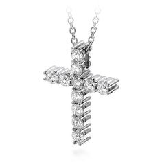 This cross pendant of perfectly cut Hearts On Fire diamonds will be a forever piece in your jewel box. Diamond White Cross Pendant Necklace With Brilliant Cut, White Diamond Cross Pendant With Single Cut Diamonds, Diamond White Single Cut Cross Pendant Jewelry, Diamond White Jewelry With Single Cut Cross Pendant, Diamond White Jewelry With Single Cut Diamonds Cross Pendant, Diamond Cross Necklace With Prong Setting, Diamond Cross Necklace With Brilliant Cut, Brilliant Cut Diamond Cross Necklace, Diamond Cross Jewelry With Diamond Cut