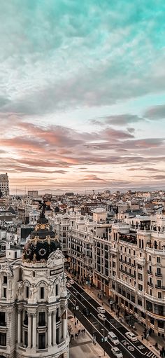 an aerial view of the city at sunset