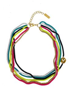 Add a rainbow and summer sunshine to your look. Six layers of colors. Gold plated and enamel coat brass chain in one necklace. Gold, Black. Yellow, Fucsia, Turquoise, and White. Let it shine with the colors of the season. Specs: 15" long plus 2" extension chain. Summer Choker Necklace With Chain, Summer Chain Choker Necklace, Adjustable Multicolor Beaded Chain Necklace, Summer Metal Necklace With Beaded Chain, Multicolor Long Beaded Necklaces With Adjustable Chain, Multicolor Beaded Long Necklace With Adjustable Chain, Multicolor Long Beaded Necklace With Adjustable Chain, Multicolor Metal Charm Necklace With Adjustable Chain, Trendy Multicolor Charm Necklace With Adjustable Chain