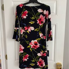 30 Inches From Shoulder To Hem. Nice Stretchy Flowing Fabric Beautiful Floral Print. Pink Floral Print Dress With 3/4 Sleeves, Pink Floral Print Dresses With 3/4 Sleeve, Tommy Hilfiger Pink Spring Dresses, Fitted Floral Print Dresses With 3/4 Sleeves, Short Shift Dress, Blue Flower Dress, Paisley Print Shirt, Trumpet Sleeves, Flowing Fabric