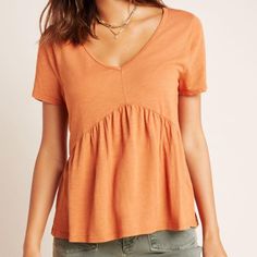 Anthropologie Holden T.La Tee T.La Size Medium Gold Short Sleeves Deep V Neckline Flounced Hem Cotton Blend New With Tags My Mannequin Has 34in Bust, 27in Waist, And 35.5in Hip Measurements. Orange V-neck Top For Day Out, Chic Orange Short Sleeve Top, Orange Short Sleeve Casual Blouse, Orange V-neck T-shirt For Summer, Orange Casual Short Sleeve Blouse, Casual Short Sleeve Orange Blouse, Casual Orange Short Sleeve Blouse, Trendy Orange Cotton Blouse, Trendy Orange Top For Day Out