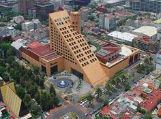 an aerial view of a city with tall buildings