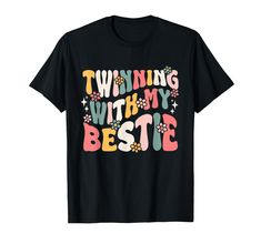 a black t - shirt with the words twining with my bestie on it