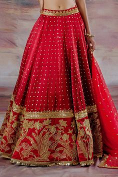 Red lehenga with jungle embroidery in cutdana, sequins. Paired with embroidered blouse and net dupatta.
Component: 3
Pattern: Embroidered
Type Of Work: Jungle
Neckline: V neck
Sleeve Type: Short Sleeves
Fabric: Net, Gajji Silk
Color: Red
Other Details: 
Jungle embroidery
Sequin and cutdana work
Embroidered blouse
Back cutout
Occasion: Sangeet, Destination Wedding - Aza Fashions Red Anarkali Gown For Traditional Ceremonies, Red Floor-length Sharara With Zari Work, Traditional Red Semi-stitched Gown, Red Chandbali Lehenga For Eid, Traditional Red Festive Gown, Red Kundan Lehenga For Eid, Red Lehenga With Intricate Embroidery For Eid, Floor-length Lehenga With Dupatta For Traditional Ceremonies, Traditional Red Gown With Dupatta