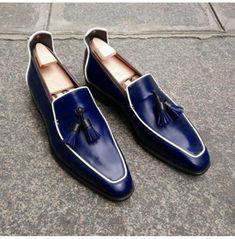 Handmade Navy Blue Square Toe Leather Moccasins, Blue Leather Dress Shoes Blue Brogue-detailed Loafers For Galas, Elegant Blue Slip-on Moccasins, Leather Tassel Loafers With Round Toe For Party, Party Leather Tassel Loafers With Round Toe, Blue Pointed Toe Leather Shoes For Semi-formal Occasions, Blue Wingtip Dress Shoes For Office, Elegant Tassel Loafers With Pointed Toe For Party, Elegant Pointed Toe Tassel Loafers For Party, Fitted Blue Leather Shoes For Semi-formal Occasions