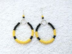 Adjustable Hoop Beaded Earrings With Black Beads, Adjustable Black Beaded Hoop Jewelry, Adjustable Black Hoop Earrings With Colorful Beads, Small Yellow Beaded Hoop Earrings, Yellow Beaded Small Hoop Earrings, Handmade Black Beaded Small Hoop Earrings, Adjustable Hoop Earrings With Black Beads, Adjustable Black Beaded Hoop Earrings, Handmade Small Yellow Hoop Earrings