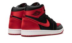 The Women’s Air Jordan 1 Retro High OG "Satin Bred" is a women’s-exclusive colorway of the legacy basketball sneaker that was originally released in this satin construction in limited quantities in 2016 (in men's sizing).  The modern “Satin Bred” Jordan 1 High OG is designed in the same color block as the Jordan 1’s original “Bred” colorway from 1985, but with satin materials instead of leather on the standard model.  Here, the “Satin Bred” features University Red-colored satin on the toe, colla Luxury Nike Jordan Shoes With Red Sole, Luxury Red Jordan Shoes With Red Sole, Tenis Retro, Tenis Nike Air, Sneakers Box, Red Jordans, Kobe Shoes, Pretty Shoes Sneakers, Streetwear Accessories