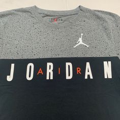 Jordan Color Block Tee T-Shirt . Brand New With Tag . Style # 956445 - Geh . Color Is Carbon Heather , Size Xl . Jordan Jumpman Logo In Front In White . Black Color Block Tops For Streetwear, Casual Black Color Block T-shirt, Black Tri-blend Tops With Letter Print, Black Color Block Graphic Tee, Gray Color Block Short Sleeve Top, Casual Black Color Block Tops, Sporty Gray Color Block T-shirt, Gray Color Block T-shirt With Short Sleeves, Gray Color Block Short Sleeve T-shirt