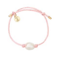 Crafted in our coastal Rhode Island workshop, the twisted rope and freshwater pearl harks back to days on the beach under a setting sun. Each lustrous rice pearl is hand-tied with a double knot for a subtle, elegant expression. Offered in six delicate shades of summer, it’s a contemporary classic and shines brightest where the waves meet the sand. Product Details: Cotton Nautical cord 12mm Freshwater Rice Pearl Solid brass, gold plated hardware Gift Box Included Kiel James Patrick, Preppy Jewelry, Reflecting Light, James Patrick, Double Knot, Jewelry Accessories Ideas, Dope Jewelry, Jewelry Essentials, Pink Sand