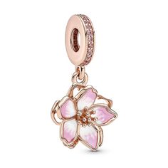 Celebrate the first signs of spring with the 14k rose gold-plated Cherry Blossom Dangle Charm. Featuring hand-applied sea pink and white enamel and accented by sparkling pink cubic zirconia, the petals on the cherry blossom rotate slightly, as if they were being blown in the breeze. A pavé-covered bail is the finishing touch on this must-have floral charm. Pandora Bracelet Charms Ideas, Pandora Bracelet Designs, Diy Jewelry Gifts, Charms Pandora, Bracelet Pandora, Pandora Style, Pandora Bracelet Charms, Bracelet Charms, Rose Gold Pink