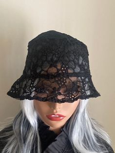 These custom made Bucket Hats are Hand Made by @FierceByFierce Wear these "and you're guaranteed to attract attention with these unique pieces. Spice up an everyday outfit, or a take a dressy outfit to a new level, or just throw one on when your having a bad hair day. The possibilities are endless.  Make it your own and let your imagination run wild. All  hats are One size, so super cool and easy to wear. Made with lace and polyester. This bucket hat will keep you stylish. One Size. Hand wash and dry flat. SHIPPING: Please allow an estimated 3-5 business days to process before shipping Please feel free to message us if you have any questions or would like something custom. Gothic Fitted Hat With Short Brim, Gothic Fitted Hats With Curved Brim, Gothic Fitted Hat With Curved Brim, Fitted Gothic Hat With Curved Brim, Fitted Black Brimmed Costume Hats, Fitted Brimmed Hat For Halloween, Black Brimmed Hat For Halloween, Fitted Black Cloche Mini Hats, Fitted Brimmed Halloween Hat